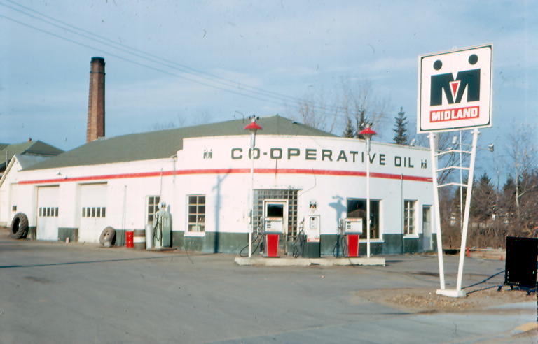 Historic Co-operative Oil station where the Middle River co-op began, with its Midland sign out front